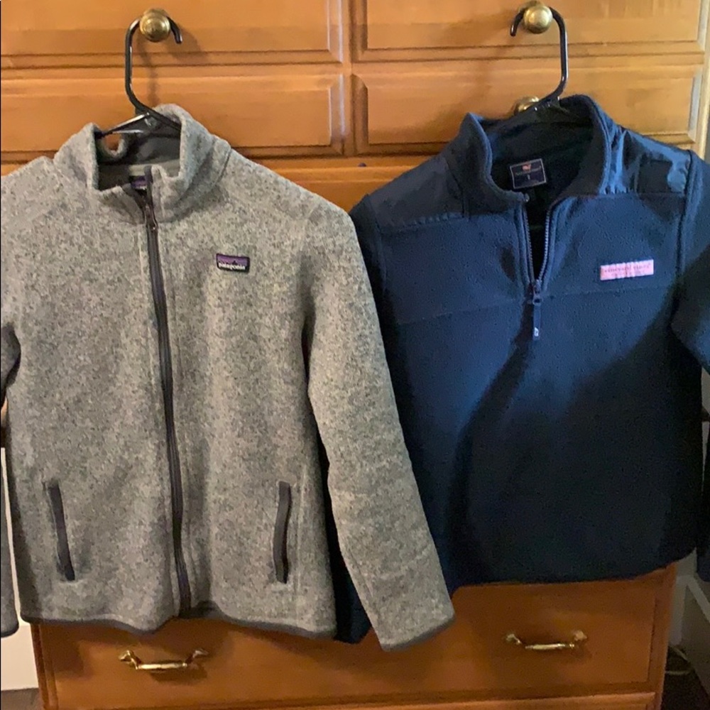 A Patagonia and a vineyard vines fleece